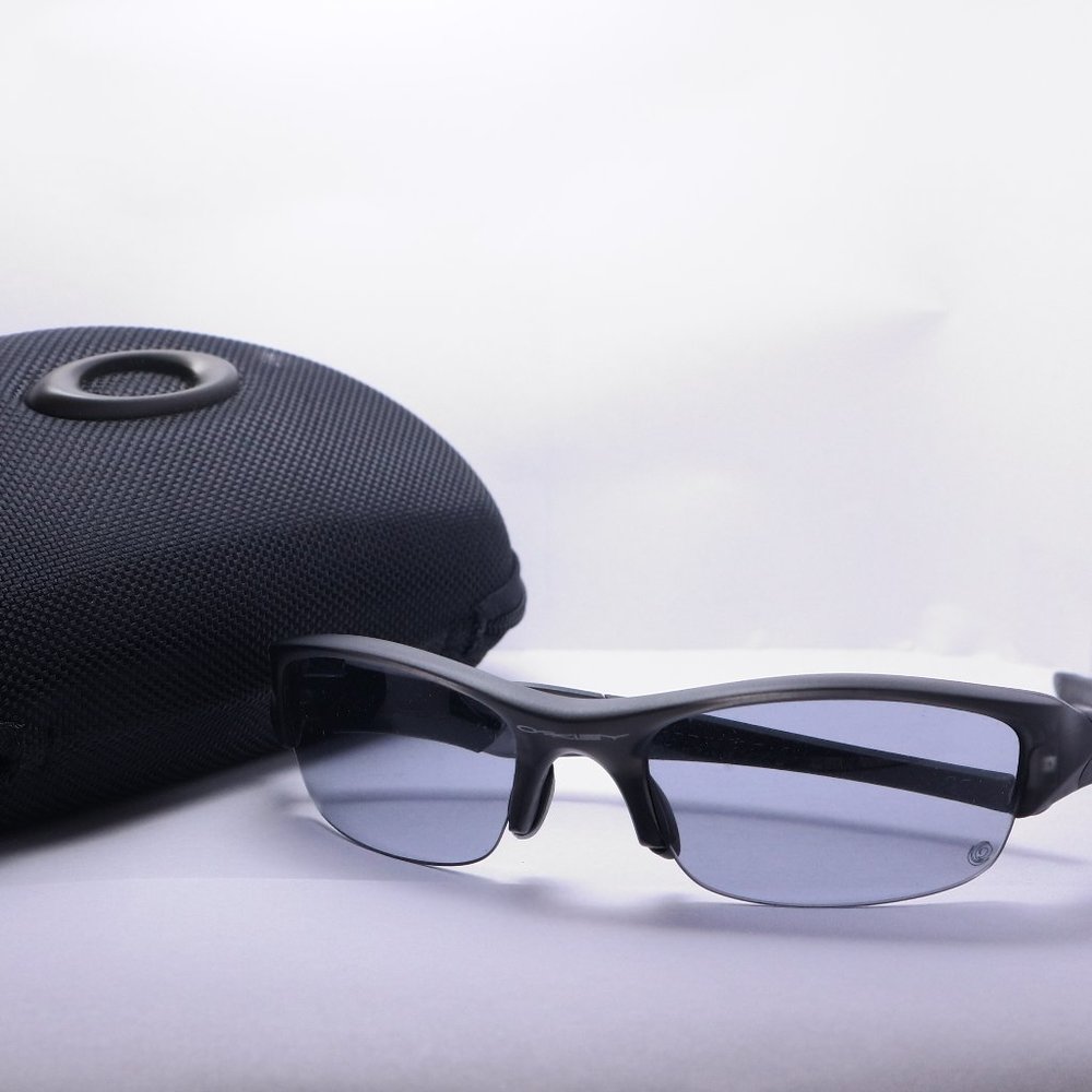 Oakley Flak Jacket Smoke Frame Transitional Lenses